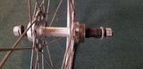 Used: 27x1 1/4 steel rear wheel. Bolt on. Free wheel