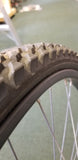 Used: 26" steel bolt on front wheel. With tire