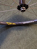 Used: front alloy quick release wheel. Rolf Satellite.